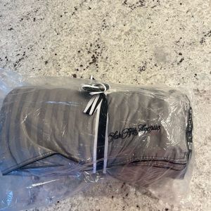 United Polaris Saks Fifth avenue quilted blanket